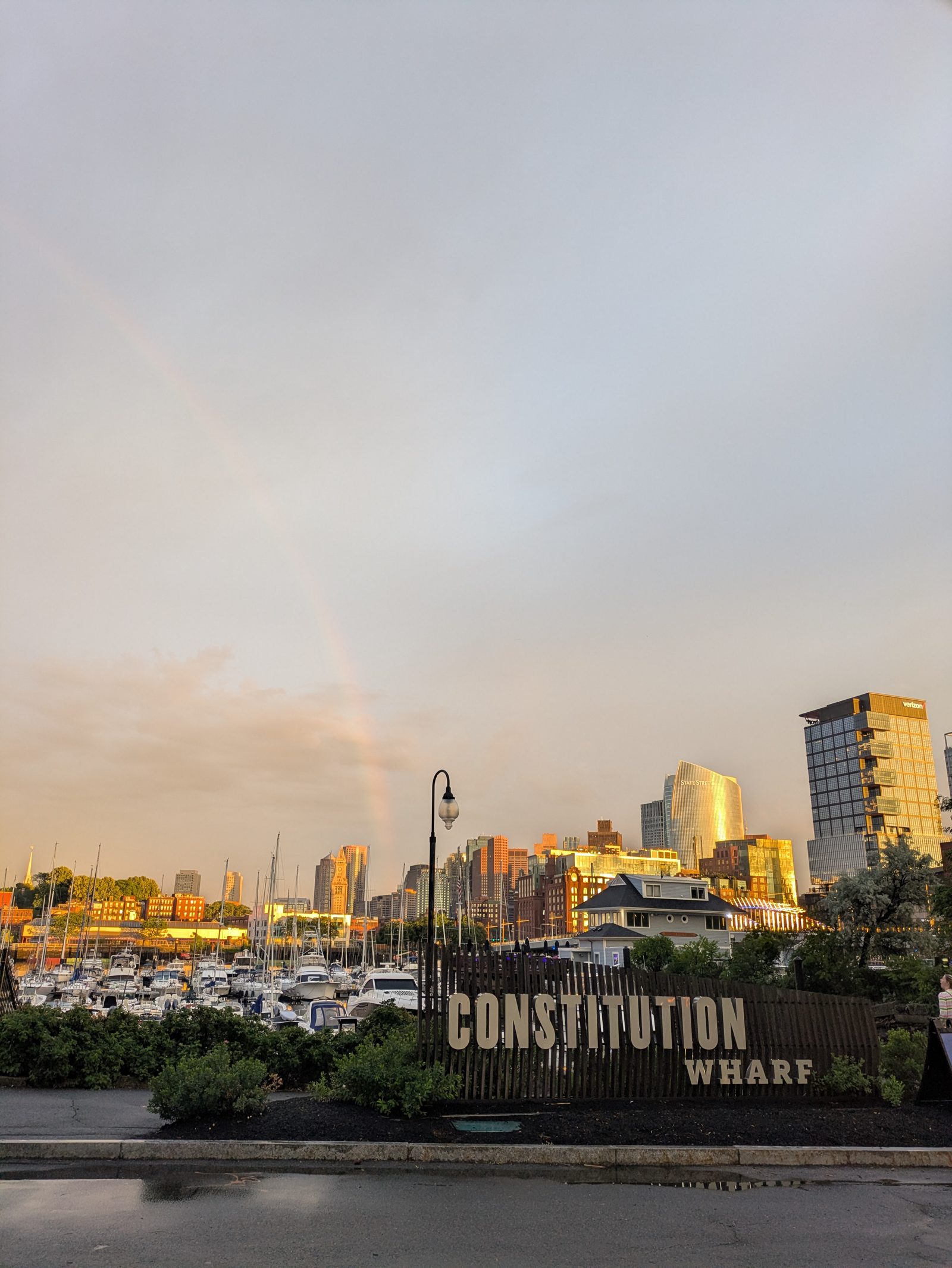 A rainbow over the downtown Boston skyline