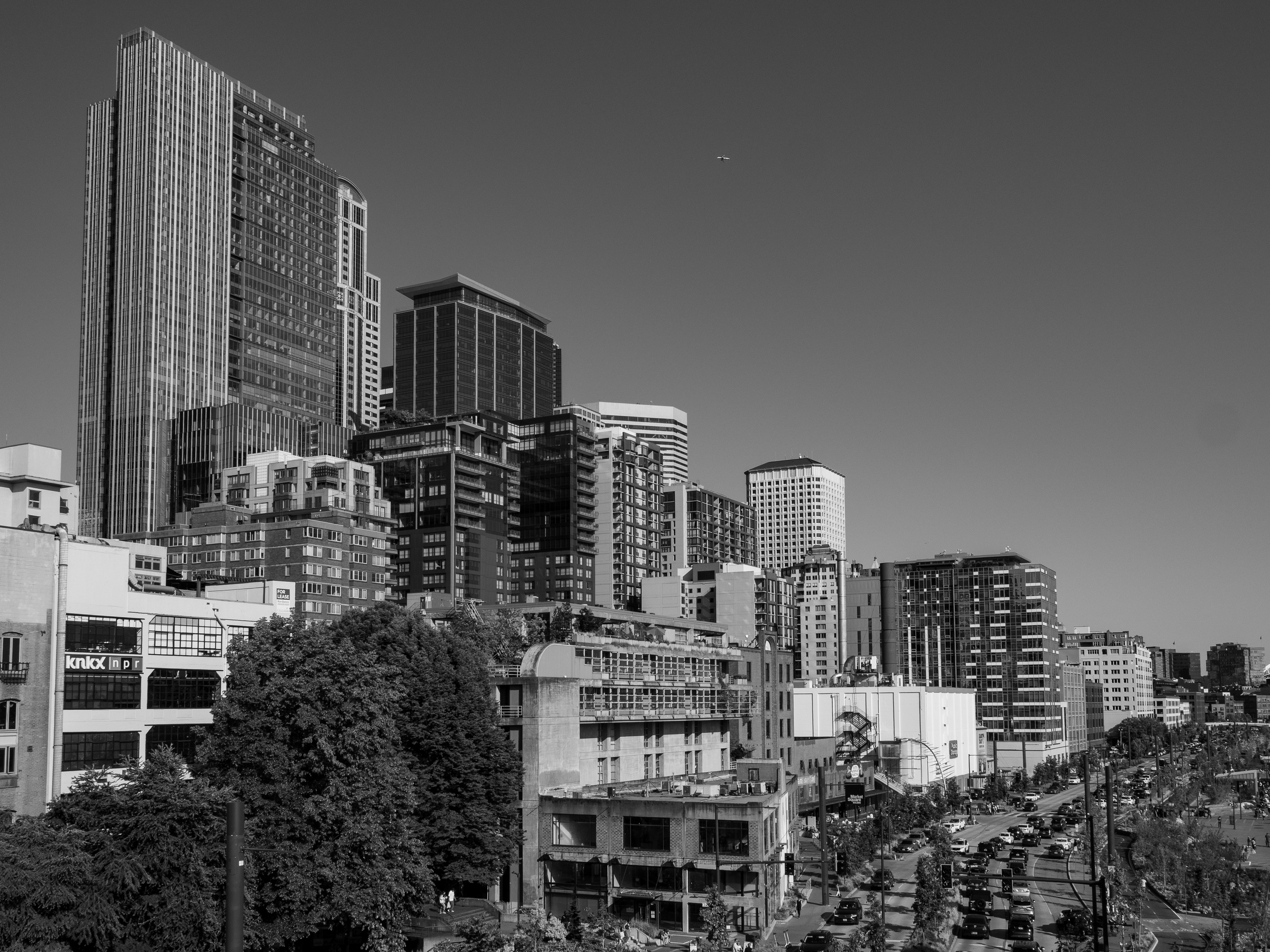 Downtown Austin, Texas features a dense cluster of modern skyscrapers and older buildings against a clear sky.